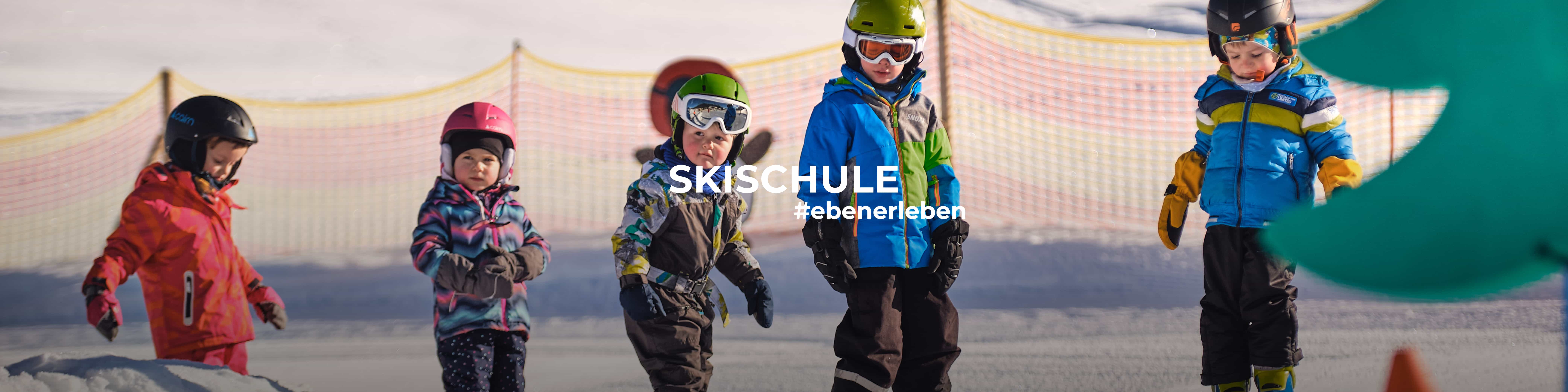 Learning to ski like the pros in the children ski school in Eben